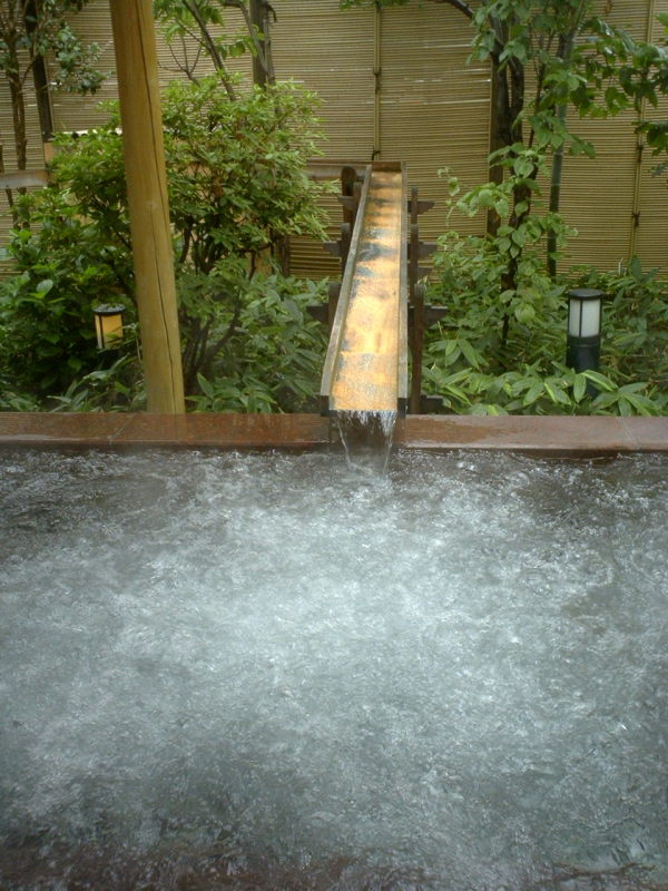 A wooden sluice provides the onsen water for this Jacuzzi-style bath, which smelled a bit too much of chlorine at last visit, and the water could have been several degrees warmer as well.